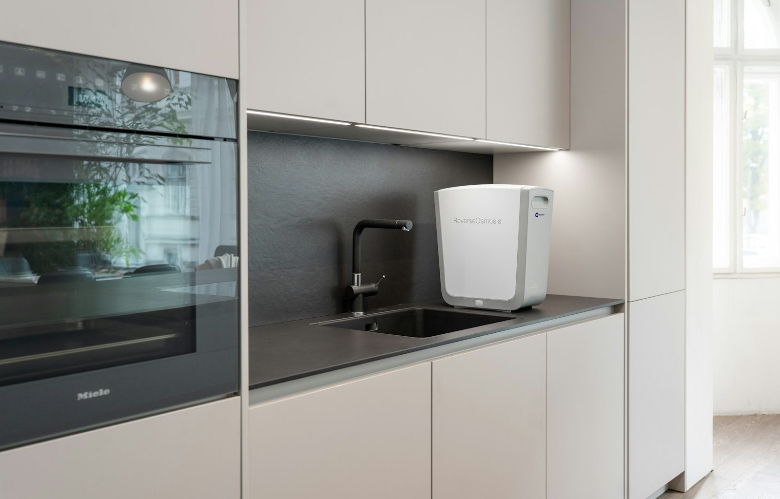 a kitchen with white cabinets