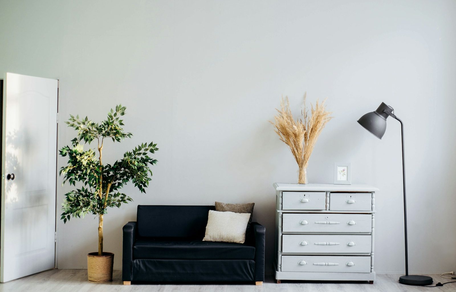 dresser beside sofa