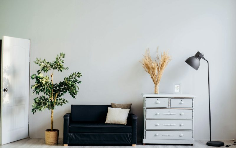 dresser beside sofa