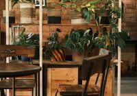 a room filled with wooden tables and chairs